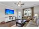 Living room with hardwood floors, comfortable seating, and a ceiling fan at 455 Switchgrass Dr, Summerville, SC 29486