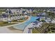Resort-style pool with lounge chairs and cabanas at 455 Switchgrass Dr, Summerville, SC 29486