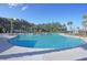 Large, inviting pool with plenty of lounge chairs and umbrellas at 455 Switchgrass Dr, Summerville, SC 29486