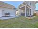 Spacious backyard with patio, grill, and screened porch at 459 Spring Hollow Dr, Charleston, SC 29492