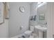 Clean and modern half bathroom with pedestal sink and toilet at 459 Spring Hollow Dr, Charleston, SC 29492