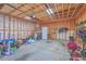 Unfinished garage with ample storage space and overhead lighting at 459 Spring Hollow Dr, Charleston, SC 29492