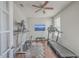 Home office or gym with standing desk, treadmill, and TV at 459 Spring Hollow Dr, Charleston, SC 29492