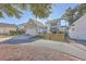 Two-story house with attached garage and fenced backyard at 459 Spring Hollow Dr, Charleston, SC 29492