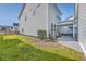 Side view of house showcasing landscaping and screened porch at 459 Spring Hollow Dr, Charleston, SC 29492