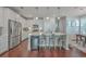 Modern kitchen with white cabinets, stainless steel appliances, and island at 459 Spring Hollow Dr, Charleston, SC 29492
