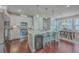 Modern kitchen with white cabinets, stainless steel appliances, and island at 459 Spring Hollow Dr, Charleston, SC 29492