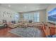 Spacious living room with hardwood floors and comfortable furniture at 459 Spring Hollow Dr, Charleston, SC 29492