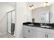 Bathroom with double vanity, granite countertop, and glass shower at 5100 Park Creek Ave, North Charleston, SC 29418
