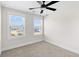 Spacious bedroom with ceiling fan and two windows at 5100 Park Creek Ave, North Charleston, SC 29418