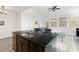 Modern kitchen with dark cabinetry and granite countertops at 5100 Park Creek Ave, North Charleston, SC 29418