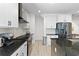 Modern kitchen with white cabinets and granite countertops at 5100 Park Creek Ave, North Charleston, SC 29418