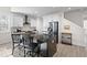 Eat-in kitchen with stainless steel appliances and island seating at 5100 Park Creek Ave, North Charleston, SC 29418