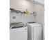 Laundry room with washer, dryer, and overhead shelving at 5100 Park Creek Ave, North Charleston, SC 29418
