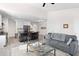 Open living room with hardwood floors and large windows at 5100 Park Creek Ave, North Charleston, SC 29418