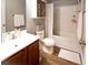 Clean bathroom with a bathtub, shower, and wood-look flooring at 524 Crossland Dr, Moncks Corner, SC 29461