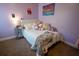 Charming bedroom with light purple walls and carpeted floor at 524 Crossland Dr, Moncks Corner, SC 29461