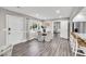 Bright dining area with hardwood floors and view into the kitchen at 561 Saint Andrews Blvd, Charleston, SC 29407