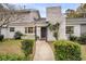 Gray house with white accents, landscaping, and a walkway at 561 Saint Andrews Blvd, Charleston, SC 29407