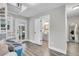 Bright hallway with spiral staircase and powder room at 561 Saint Andrews Blvd, Charleston, SC 29407