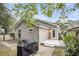 Back of house with deck and grill, showcasing the home's exterior at 561 Saint Andrews Blvd, Charleston, SC 29407