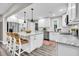 Spacious kitchen with white shaker cabinets, marble countertops, and stainless steel appliances at 561 Saint Andrews Blvd, Charleston, SC 29407