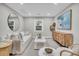 Cozy living room featuring a white sofa and a modern media console at 561 Saint Andrews Blvd, Charleston, SC 29407