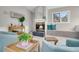 Cozy sitting area with fireplace and wicker furniture at 561 Saint Andrews Blvd, Charleston, SC 29407