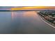 Aerial view of waterfront homes and cityscape at sunset at 14 1/2 Murray Blvd, Charleston, SC 29401