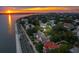 Aerial view of charming neighborhood near the water at sunset at 14 1/2 Murray Blvd, Charleston, SC 29401
