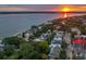 Stunning aerial view of waterfront homes at sunset at 14 1/2 Murray Blvd, Charleston, SC 29401