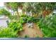 Private backyard oasis with lush landscaping and patio at 14 1/2 Murray Blvd, Charleston, SC 29401