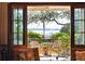 Waterfront view from a relaxing balcony, furnished with comfortable seating at 14 1/2 Murray Blvd, Charleston, SC 29401