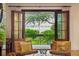 Scenic waterfront view from a private balcony, accessible through French doors at 14 1/2 Murray Blvd, Charleston, SC 29401