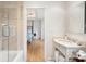 Chic bathroom with glass shower, soaking tub, and updated vanity at 14 1/2 Murray Blvd, Charleston, SC 29401