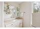 Bright bathroom with a vanity and a large mirror at 14 1/2 Murray Blvd, Charleston, SC 29401