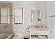Bathroom with shower/tub combo, vanity, and window at 14 1/2 Murray Blvd, Charleston, SC 29401