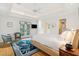 Main bedroom with a king-size bed and access to a balcony at 14 1/2 Murray Blvd, Charleston, SC 29401