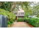 Beautiful two-story home with a gated driveway at 14 1/2 Murray Blvd, Charleston, SC 29401