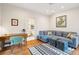Bright Gathering room with sectional sofa, wooden floors and an ensuite bathroom at 14 1/2 Murray Blvd, Charleston, SC 29401