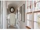 Light and airy hallway with framed art and natural light at 14 1/2 Murray Blvd, Charleston, SC 29401