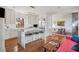 Spacious kitchen featuring white cabinets, stainless steel appliances, and a large island at 14 1/2 Murray Blvd, Charleston, SC 29401