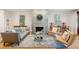 Spacious living room featuring a stunning fireplace and comfortable seating at 14 1/2 Murray Blvd, Charleston, SC 29401