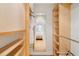 Large walk-in closet with built-in shelves and rods at 14 1/2 Murray Blvd, Charleston, SC 29401
