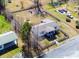 Charming single-story home with a fenced yard, mature trees, and a driveway with multiple vehicles at 141 Nottingham Ln, Yemassee, SC 29945