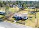 Well-maintained single-story home with a fenced yard and walkway leading to the front porch at 141 Nottingham Ln, Yemassee, SC 29945