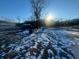 Snow-covered backyard with a few items visible at 141 Nottingham Ln, Yemassee, SC 29945