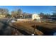 Cozy white cottage with wooden fence and yard at 141 Nottingham Ln, Yemassee, SC 29945