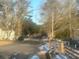 Residential street with houses and snow on the ground at 141 Nottingham Ln, Yemassee, SC 29945