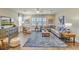 Relaxing living room featuring a large sectional sofa and a wood-look floor at 143 Winding Grove Ln, Moncks Corner, SC 29461
